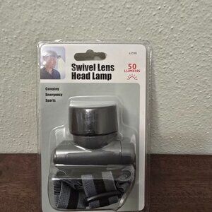 Swivel lens head lamp. NEW